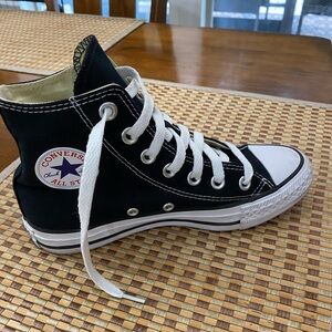 Women’s black high top converse